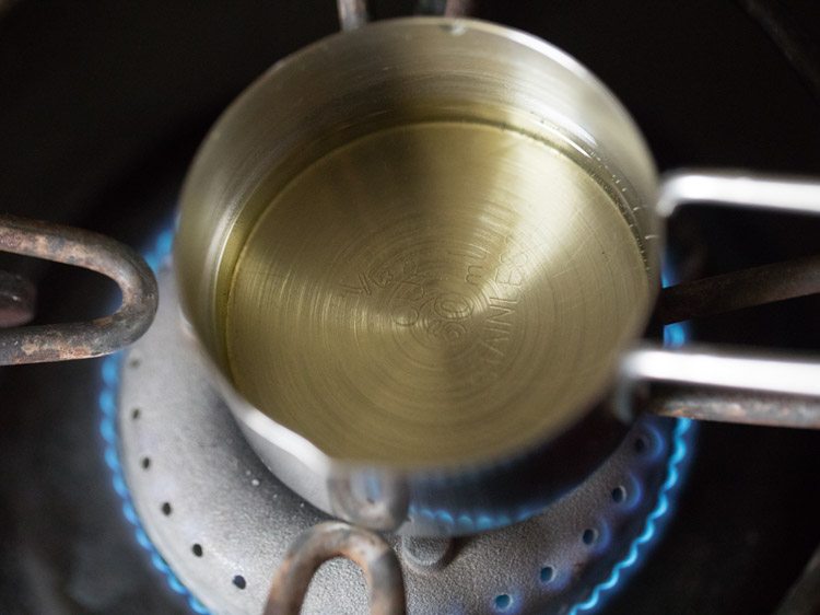 heating oil in a steel bowl. 
