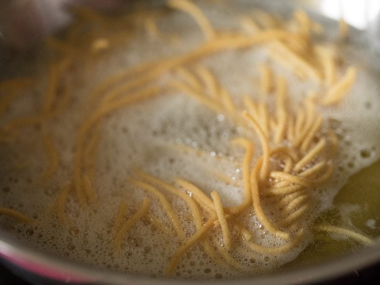 frying omapodi in hot oil. 