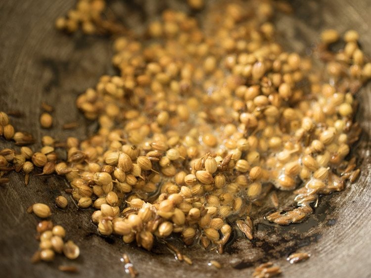 frying coriander seeds and cumin seeds. 