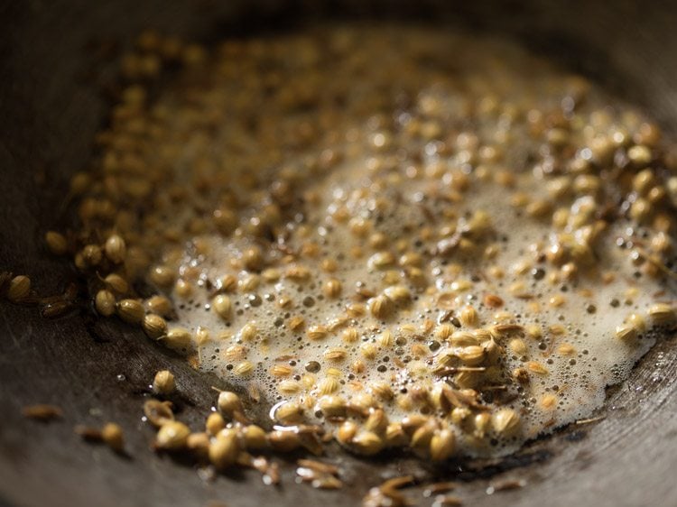 frying coriander seeds and cumin seeds till fragrant. 