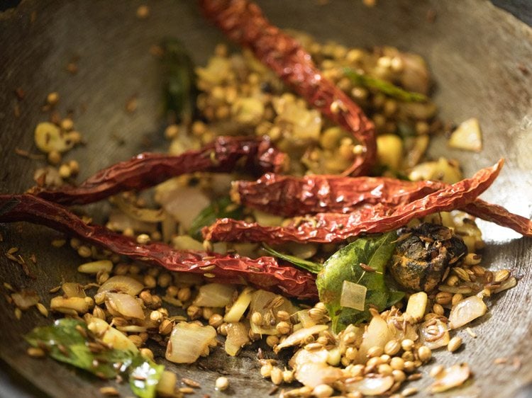 ingredients mixed well with the spice mixture for paneer gassi recipe. 