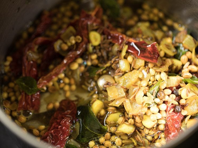 fried spice mixture and water added to a grinder jar. 