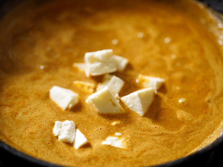 cubed paneer added to the gravy. 