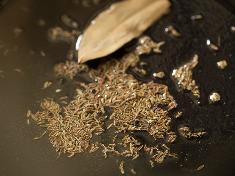 sautéing spices in hot oil. 