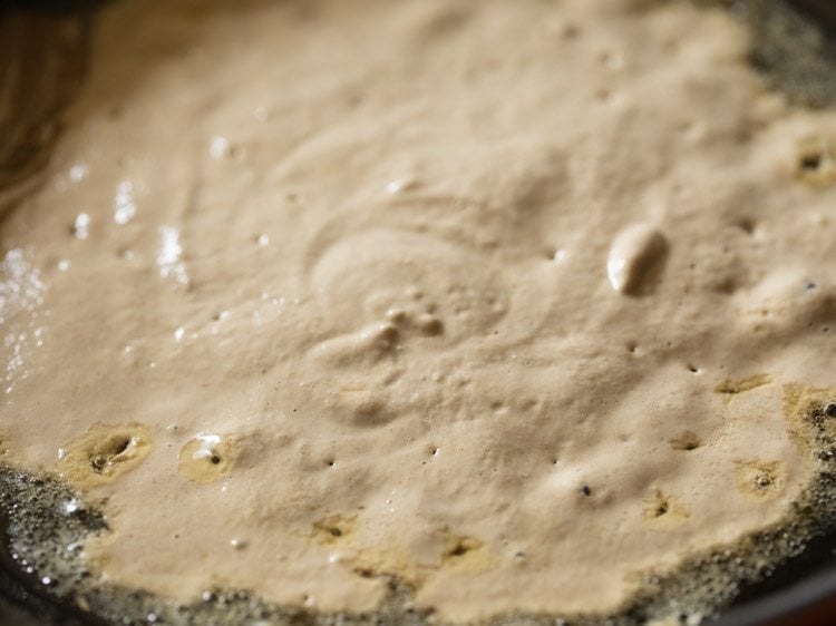 prepared onion paste added to the pan. 