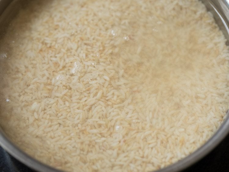 soaking rice in water. 