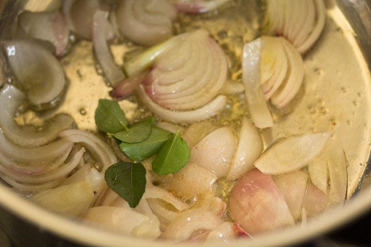 curry leaves and asafoetida added to the onions. 