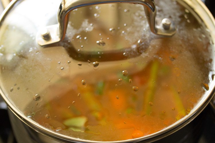 cooking vegetables in a covered pan. 