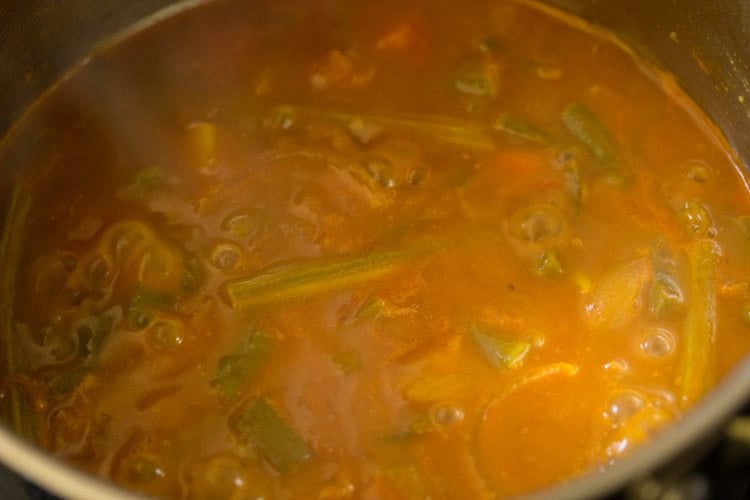 simmering sambar till well cooked. 