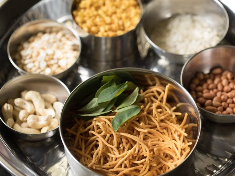 ingredients kept ready for south indian mixture recipe. 