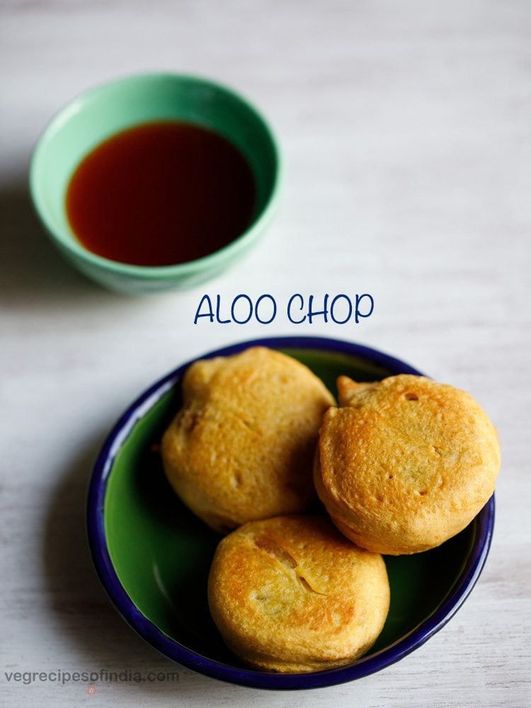 Potato chops are served on a green plate with a small green bowl of sweet tamarind chutney placed on the top left side and text layover.