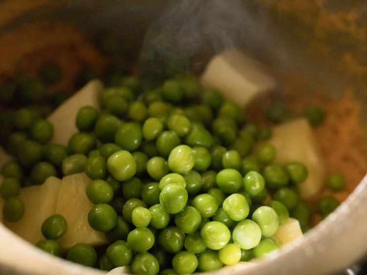 making aloo matar paneer gravy recipe