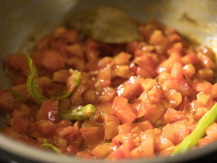 sautéing tomato mixture. 