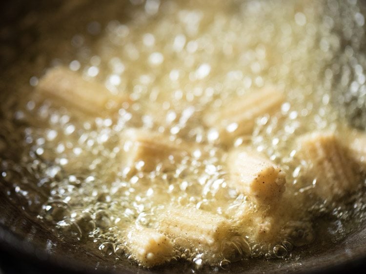 frying baby corn to make baby corn manchurian gravy recipe