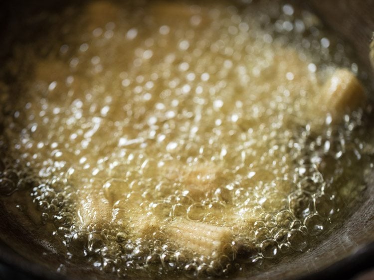 frying baby corn to make baby corn manchurian gravy recipe