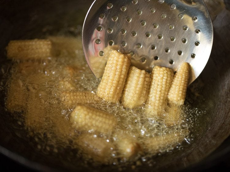 frying baby corn to make baby corn manchurian gravy recipe