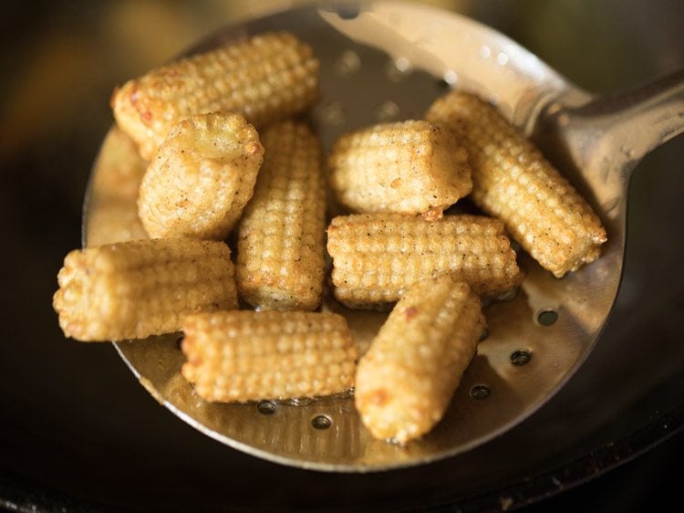 frying baby corn to make baby corn manchurian gravy recipe