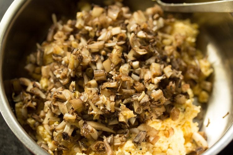 ground chana dal paste and chopped banana flower in a bowl