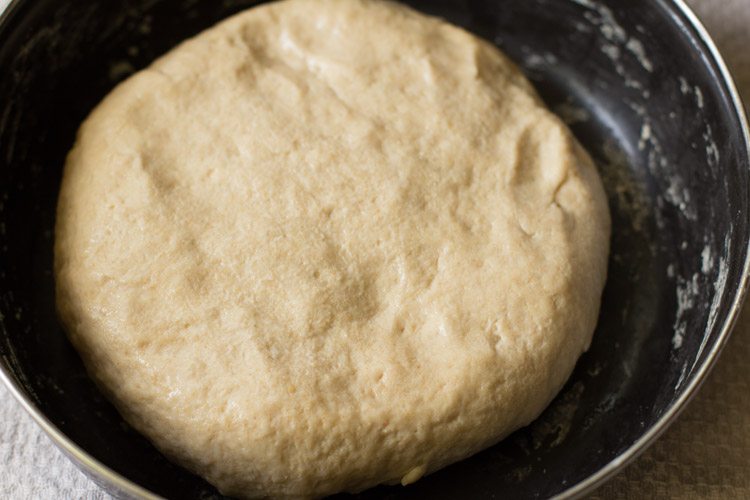 prepared dough flattened and kept for leavening. 