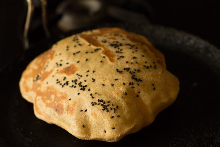 one side of the cheese naan roasted well. 