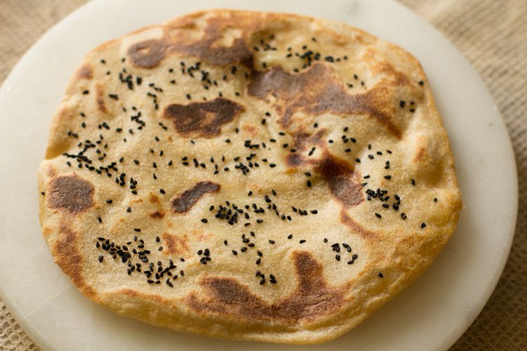 roasted cheese naan on a plate. 