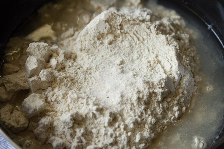 whole wheat flour and salt added in the bowl. 