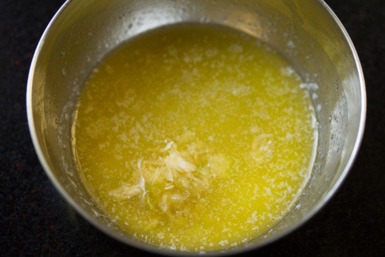 crushed garlic added to the melted butter. 