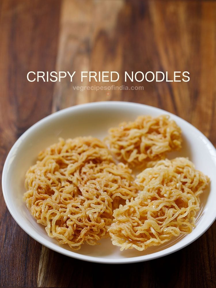 fried noodles served on a white plate with text layover.