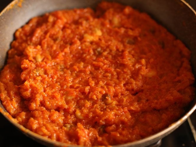 gajar halwa made with khoya thickened and cooked in pan