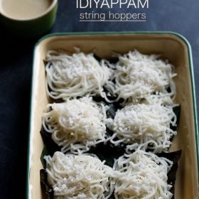 idiyappam sprinkled with grated coconut and placed on banana leaves on a tray with a bowl of coconut chutney kept on the top left side and text layovers.