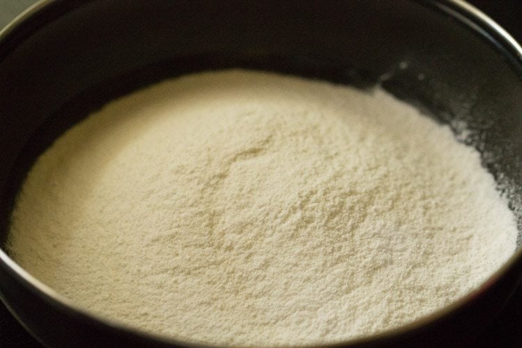 puttu flour in a pan. 