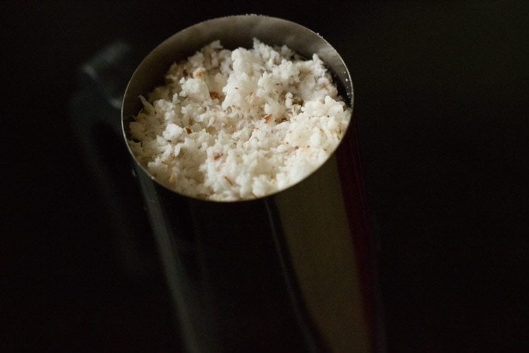 grated coconut spread evenly on the top. 