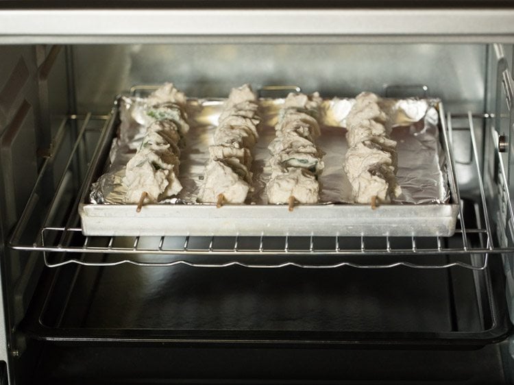 grilling paneer malai tikka in the oven. 