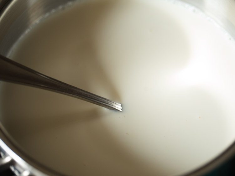 stirring milk while heating. 