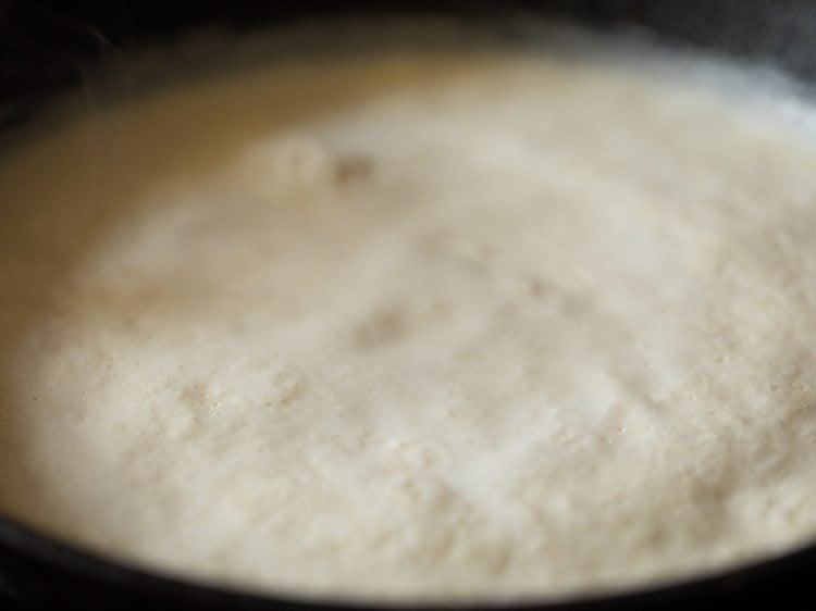 milk getting reduced while boiling. 