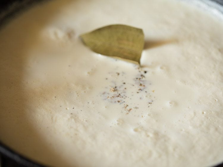 bay leaf and cardamom powder added to the milk. 