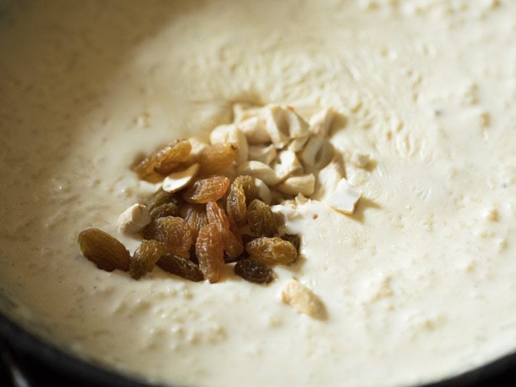 chopped cashews and raisins added to the cooked nolen gurer payesh. 