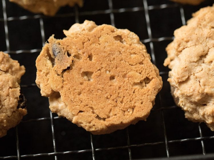 underside of an oatmeal cookie to show golden color. 