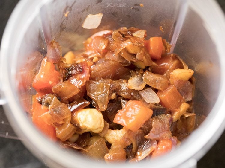 onion tomato masala mixture added to grinder jar