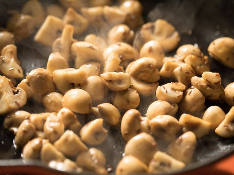 stirring and sauteing mushrooms