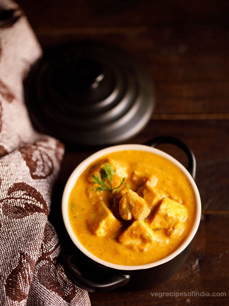 mushroom paneer served in a white bowl