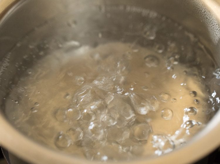 Rolling boil of water.