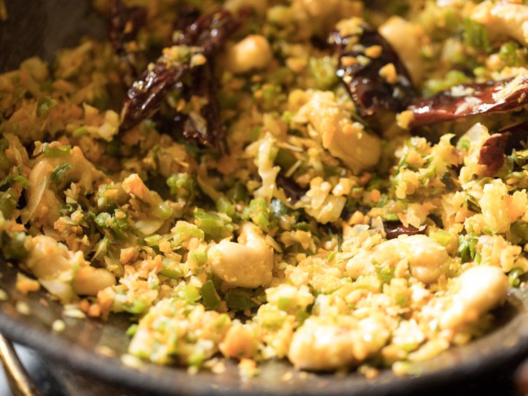 Cashew nuts, chili, spring onions, cabbage, carrots, capsicum, and French beans stir-fried until golden.