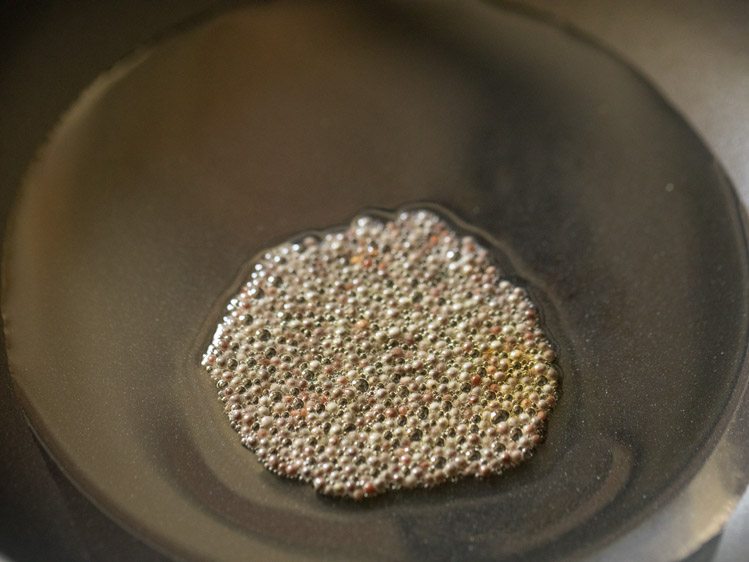 mustard seeds crackling in hot oil. 