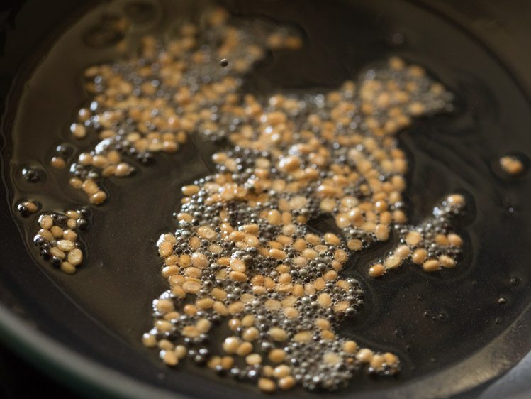 frying urad dal till light golden. 