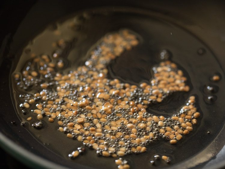 frying urad dal till golden. 