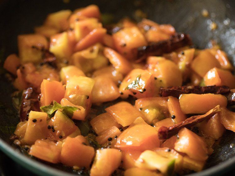 sautéing tomato mixture for thakkali pachadi. 