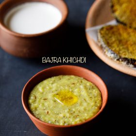 bajra khichdi or pearl millet khichdi in a rustic clay bowl topped with some ghee with text layovers.