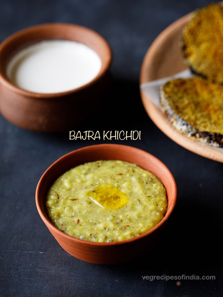 bajra khichdi or pearl millet khichdi in a rustic clay bowl topped with some ghee with text layovers.
