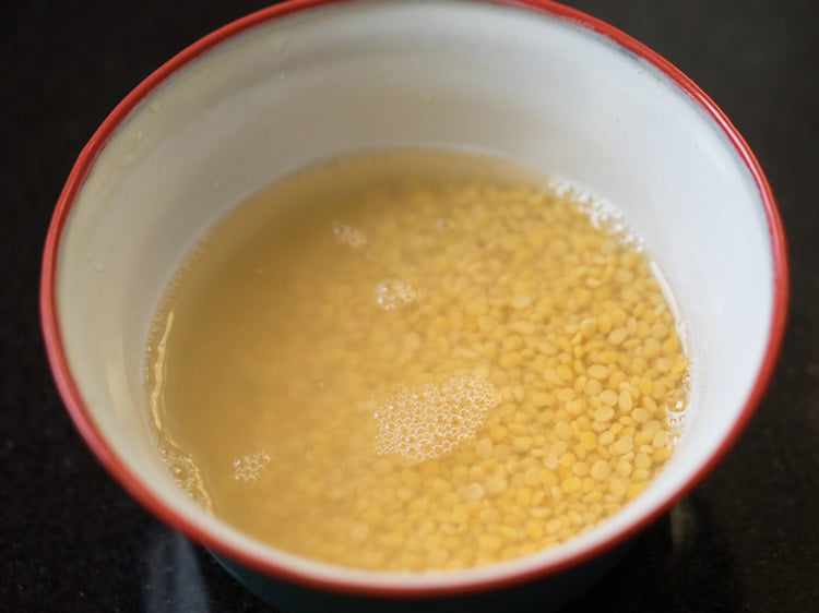 soaking moong dal in water.